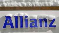 A logo for Allianz, Europe's biggest insurer covered in snow outside of a branch in the town of Davos, Switzerland